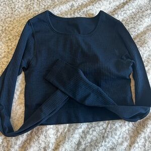 Lululemon long sleeved navy cropped wunder under shirt with built in bra